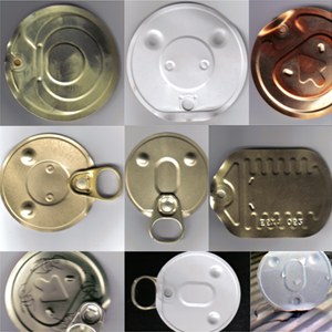 Staring out from the lids of cats tins